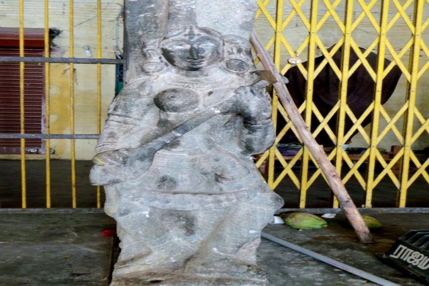 Figure 20. A lady holding a Vina